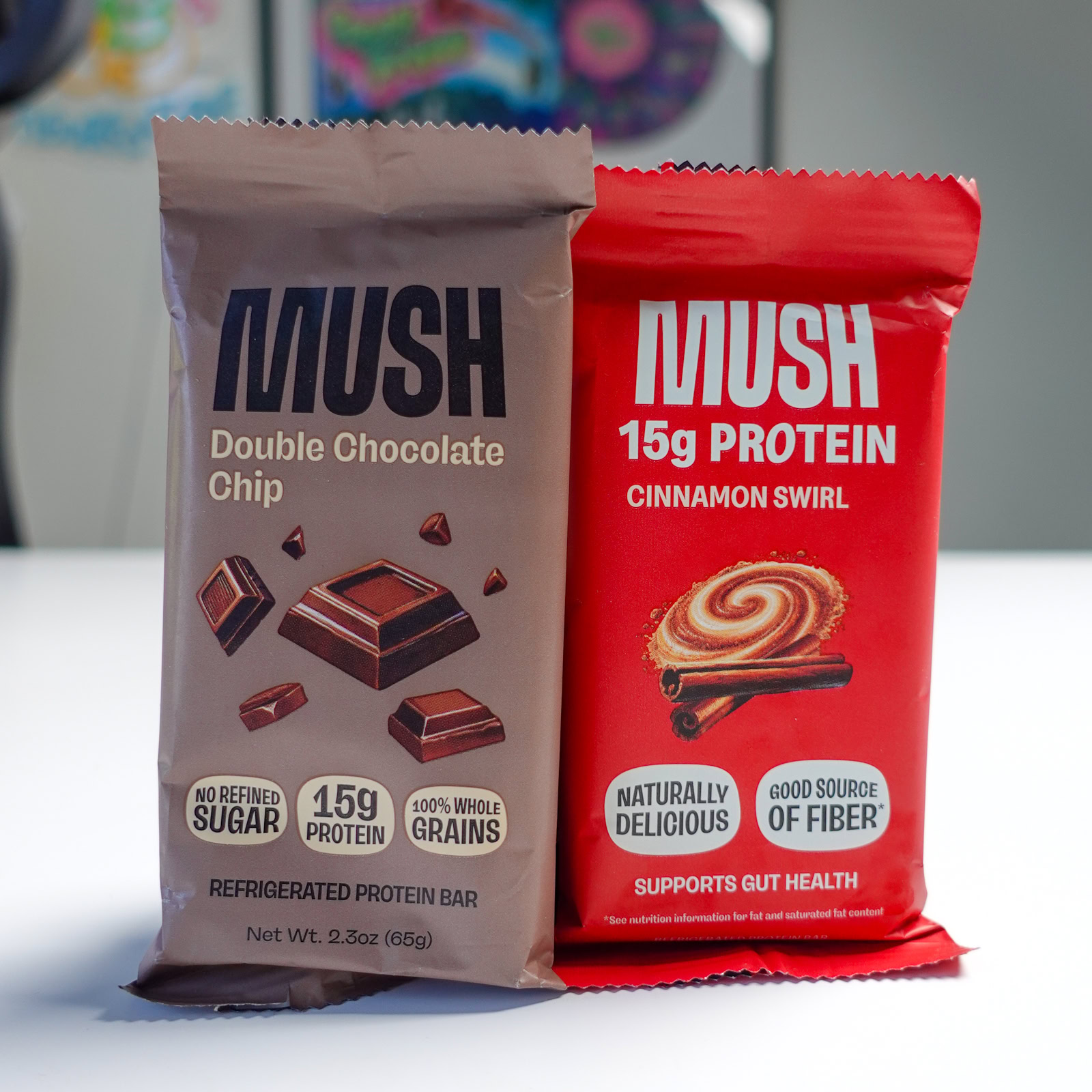 MUSH protein bars with double chocolate and cinnamon swirl flavors.
